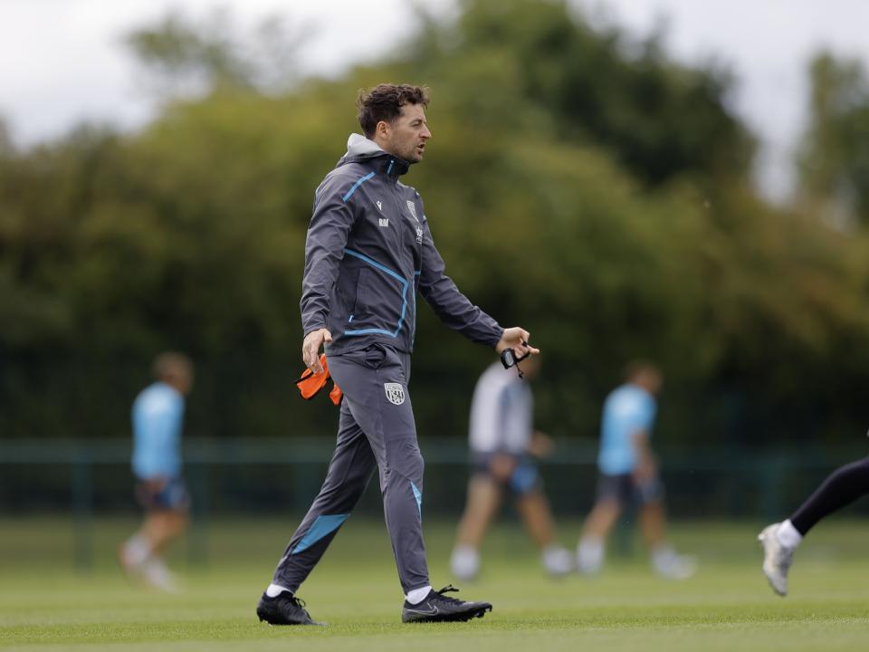 Ryan Mason delivering instructions during a training session