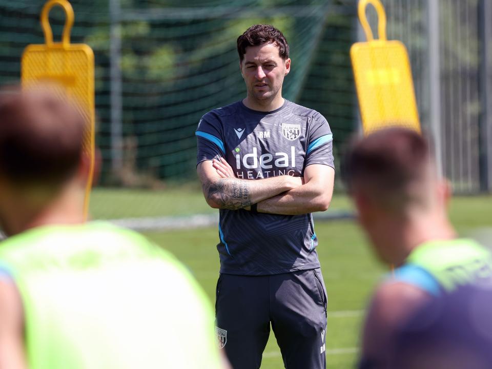 Ryan Mason watching a training session in Austria