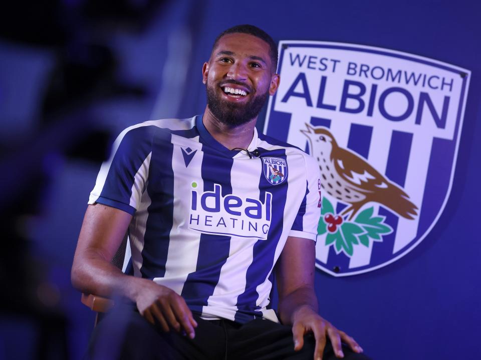 George Campbell smiling while sat in a WBA home shirt and being interviewed by WBA TV