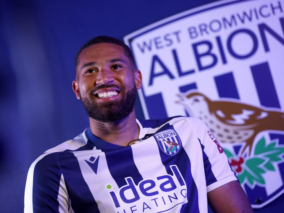 George Campbell smiling while sat in a WBA home shirt and being interviewed by WBA TV