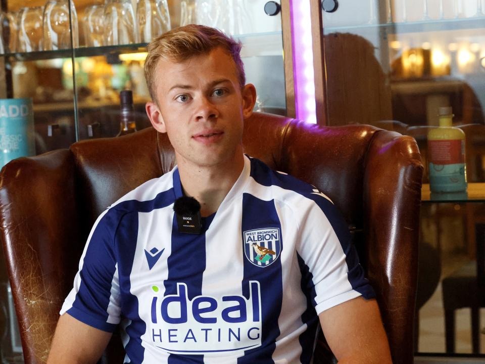 Aune Heggebø sat in a WBA shirt in a chair being interviewed by WBA TV