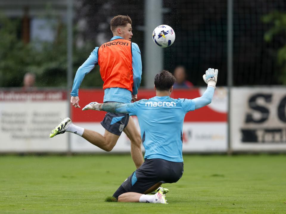 Isaac Price in action during a training session in the rain