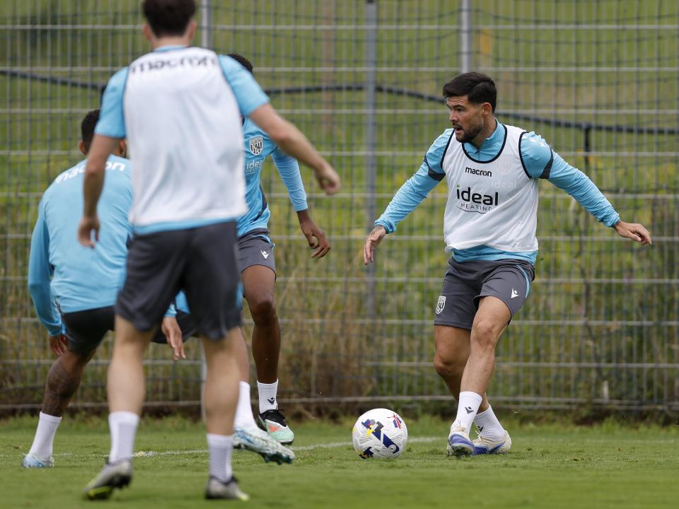Alex Mowatt on the ball during training 
