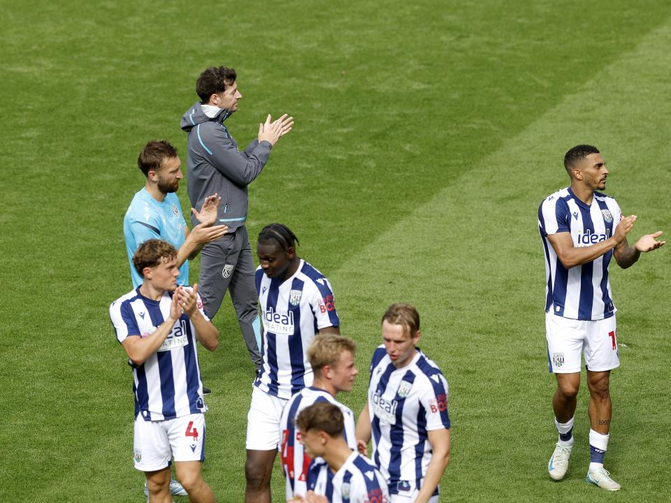 Ryan Mason and Albion players applaud WBA fans after the Blackpool game