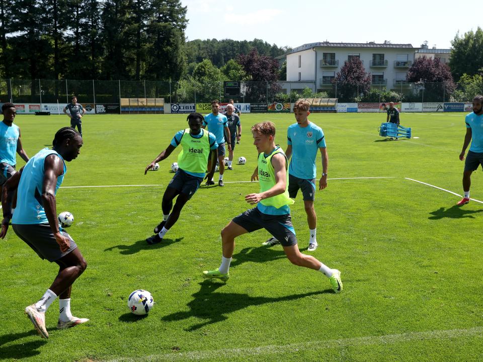Several players involved in a small-sided game in training