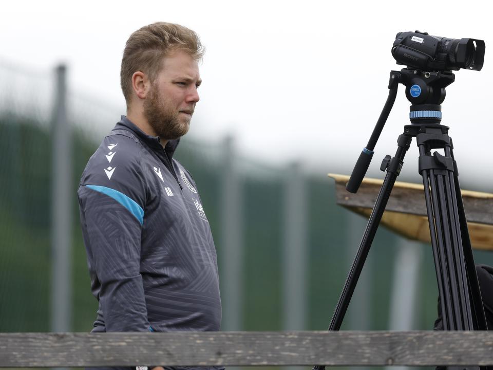 Albion analyst Aaron Rymer filming training with a camera 