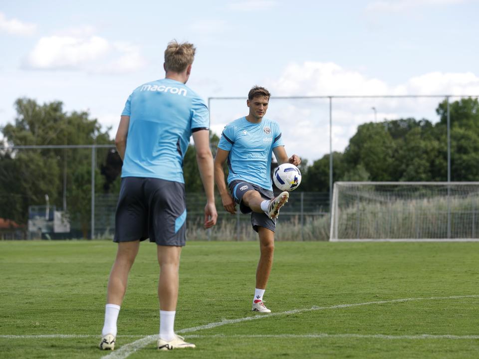 Caleb Taylor on the ball during training 