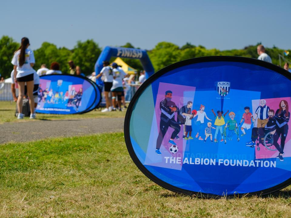 Close up of Foundation Branding on the grass.