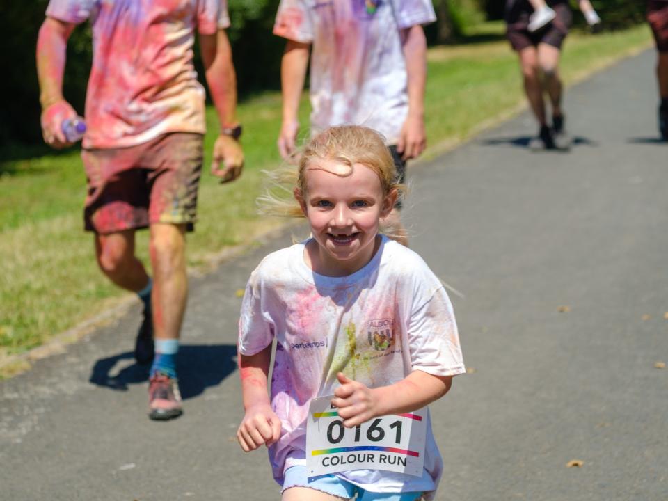 Close up of young girl with huge smile