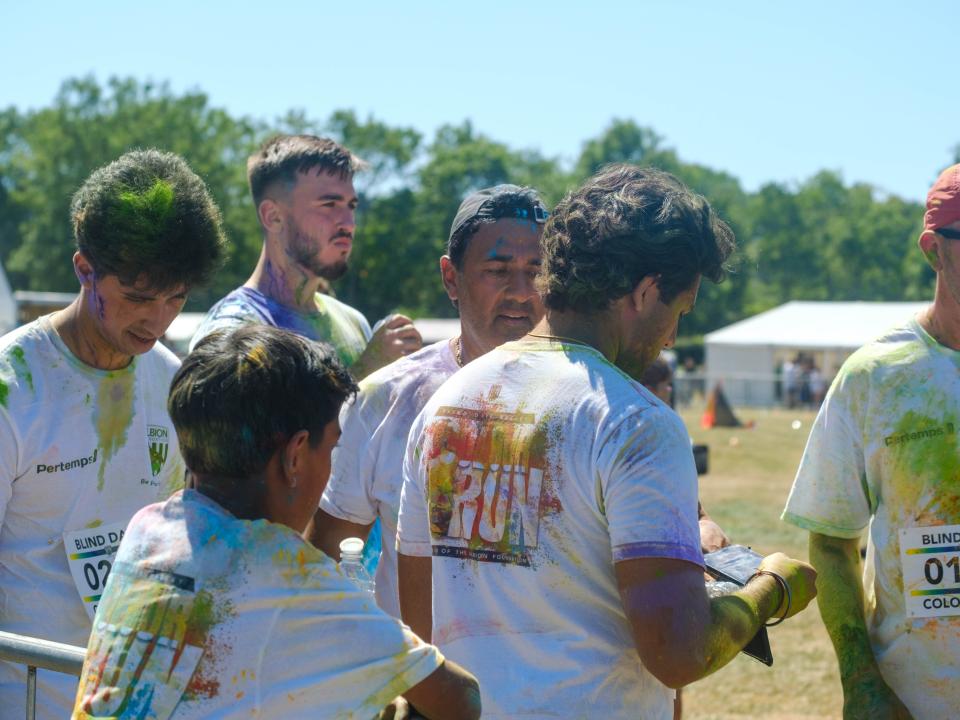 Group of men gathered.