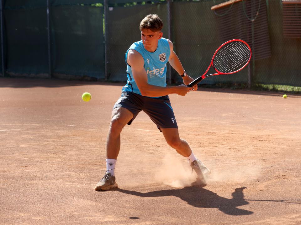 Tom Fellows playing tennis in Austria 