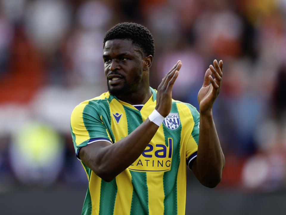 A photo of Josh Maja applauding the Albion fans at Lincoln