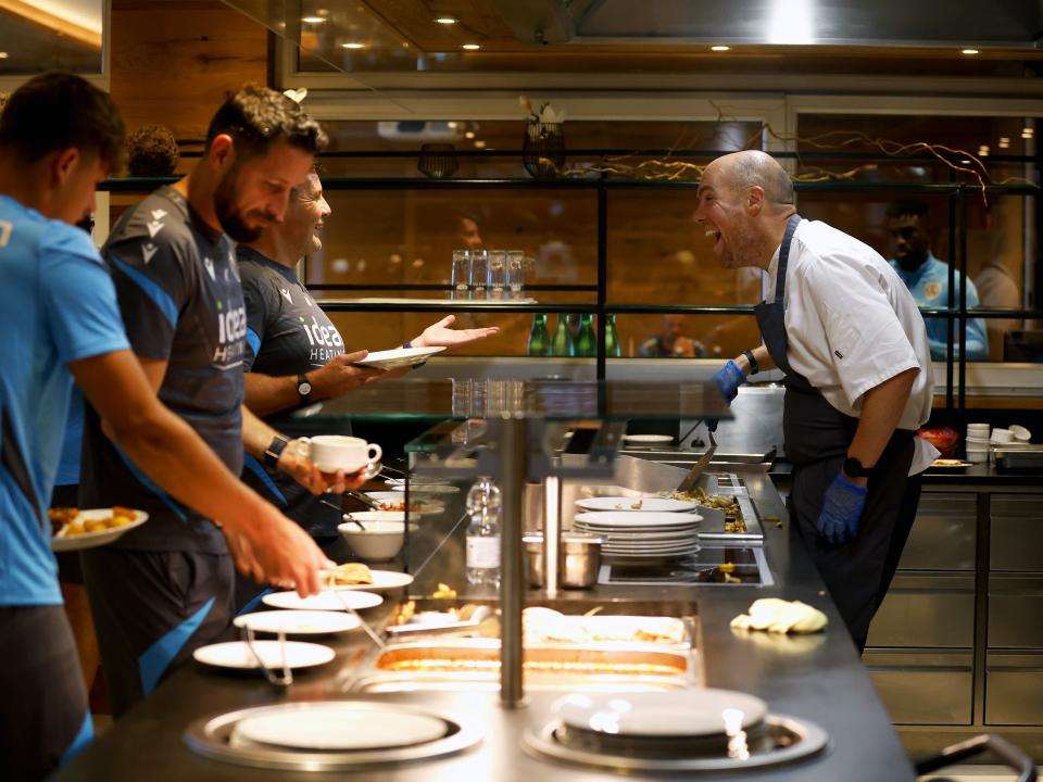 Albion's chef preparing food and talking to players and staff in Austria 