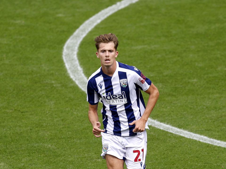 Isaac Price in action for WBA in the home kit 