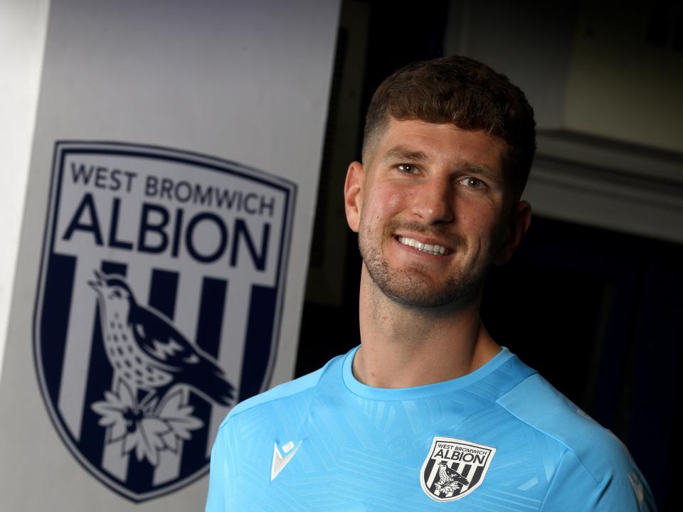 Chris Mepham smiling at the camera 