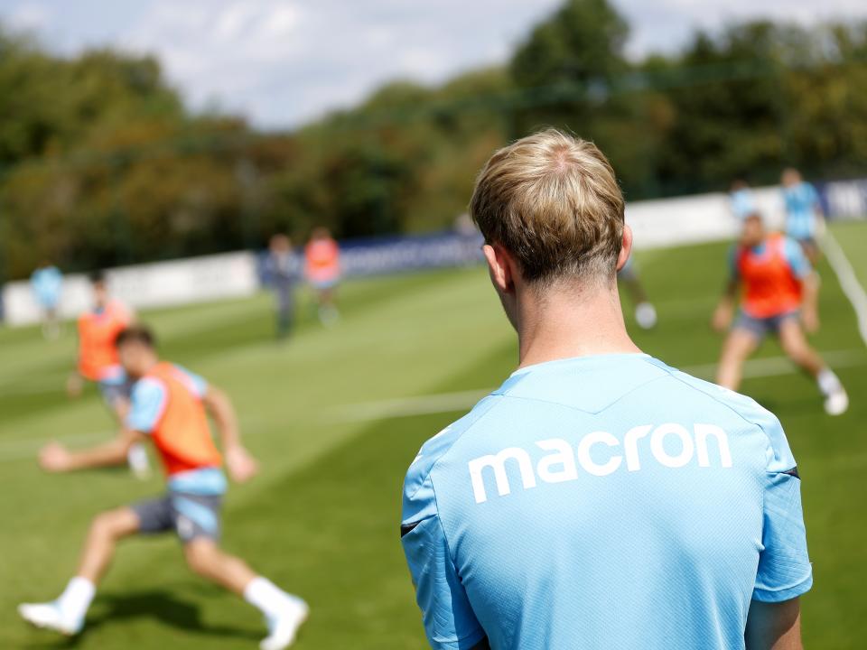 Toby Collyer watching training 