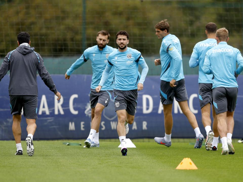 Several players warming up during a training session