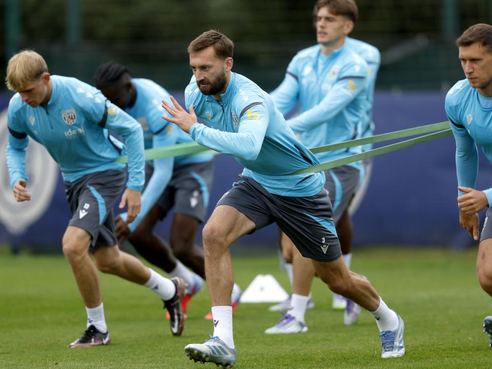 Several players warming up during a training session