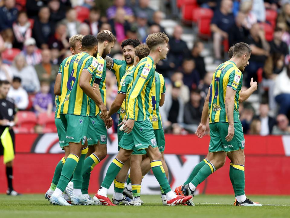 Nat Phillips celebrates scoring v Stoke with team-mates