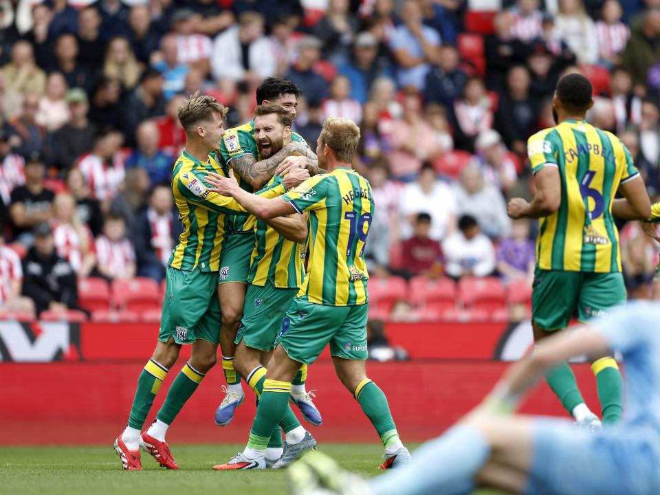Nat Phillips celebrates scoring v Stoke with team-mates