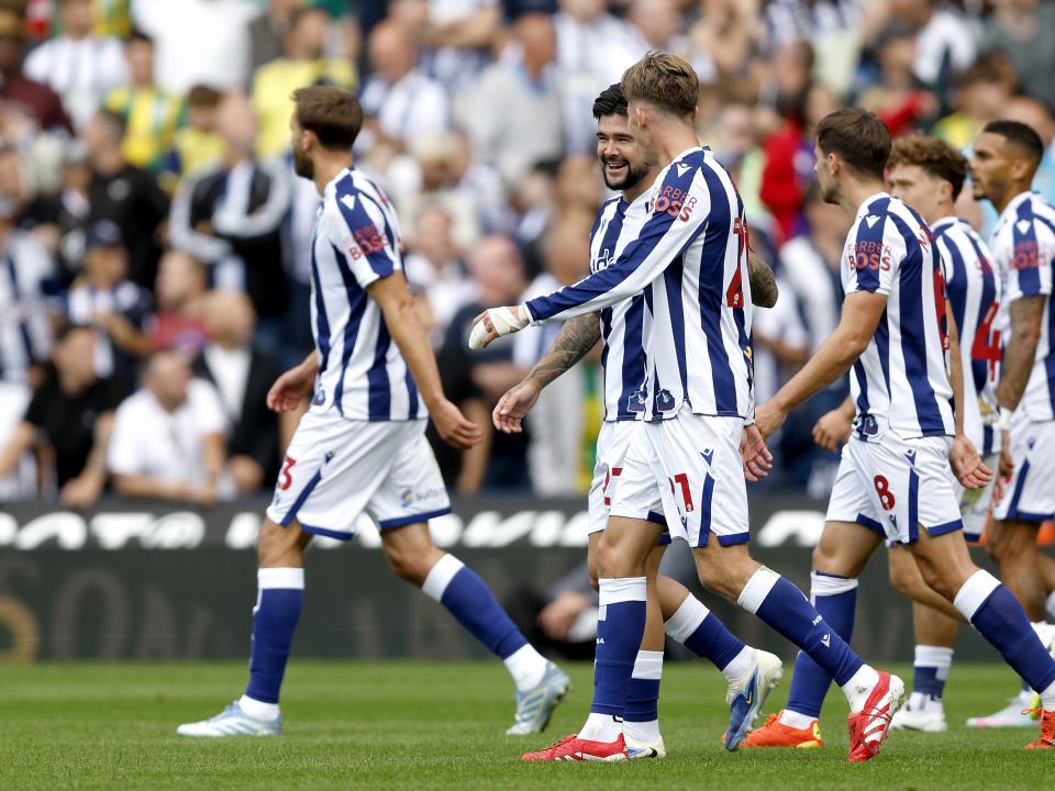 Isaac Price celebrates with team-mates after scoring against Blackburn 