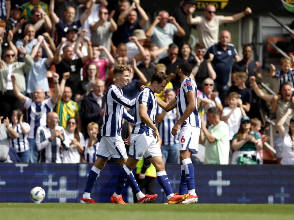 Isaac Price celebrates scoring his first goal at Wrexham with team-mates
