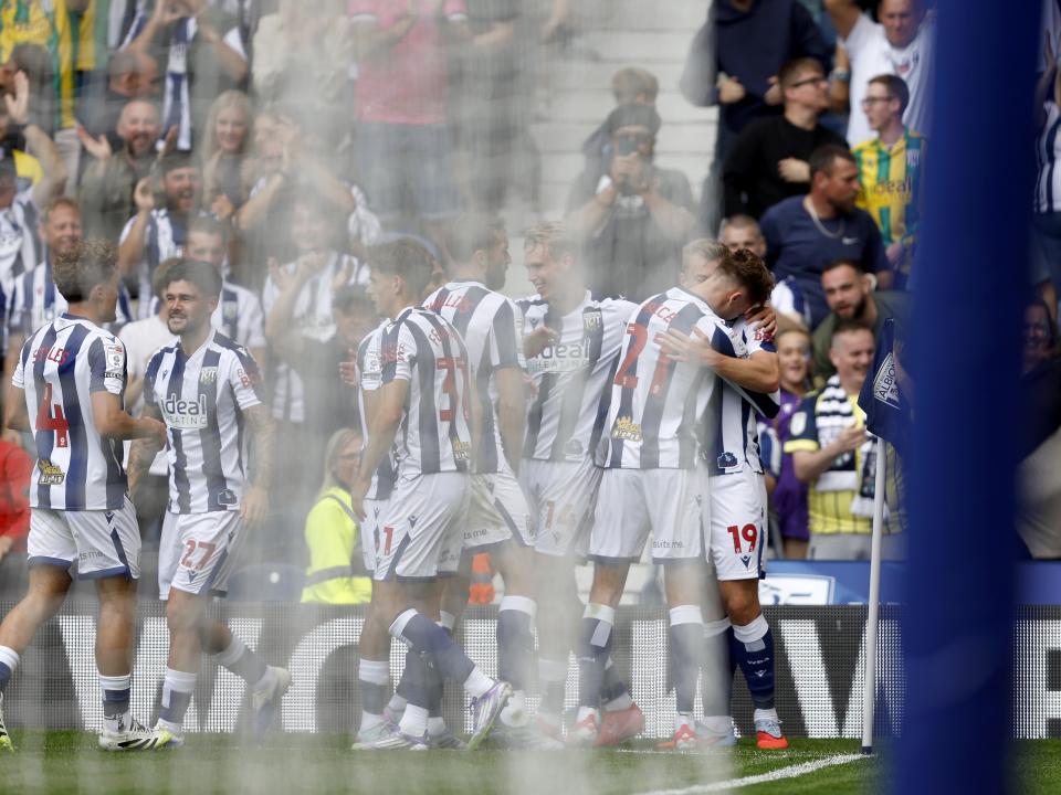 Isaac Price celebrates with team-mates after scoring against Blackburn 