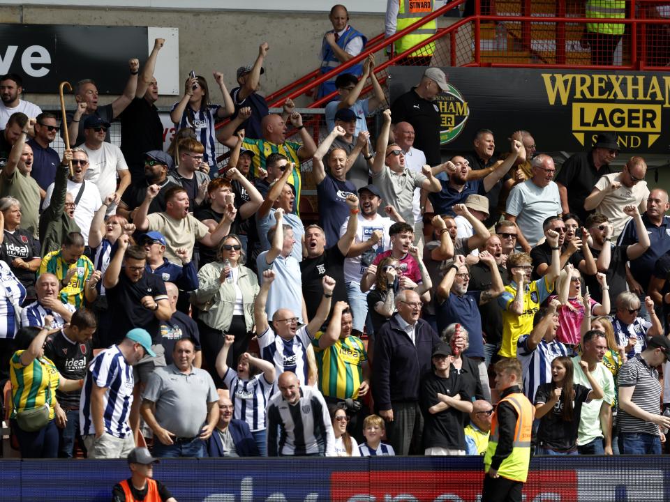 Albion fans celebrating a goal at Wrexham 