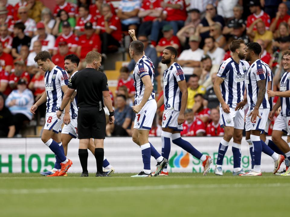 Jed Wallace celebrates with team-mates after scoring against Wrexham