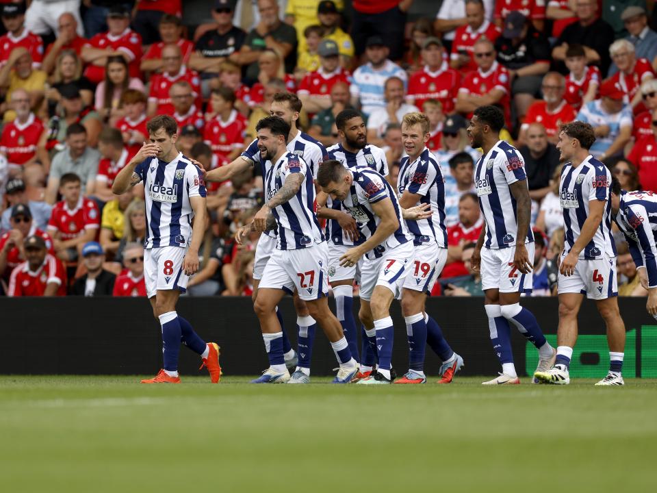 Jed Wallace celebrates with team-mates after scoring against Wrexham