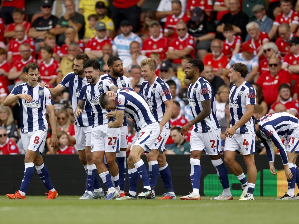 Jed Wallace celebrates with team-mates after scoring against Wrexham