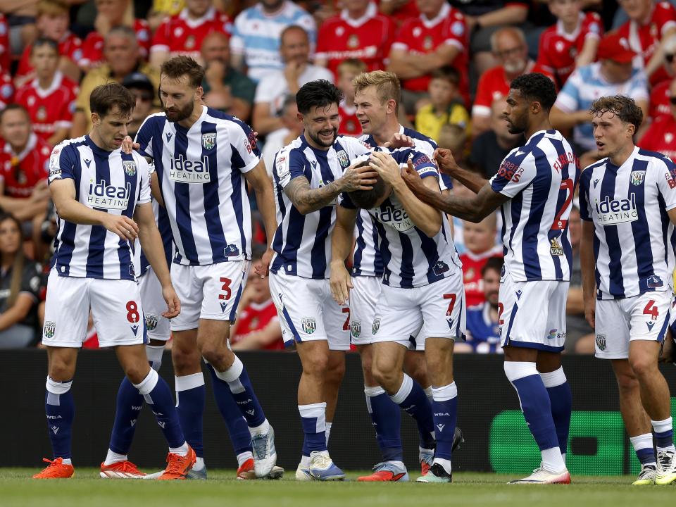 Jed Wallace celebrates with team-mates after scoring against Wrexham