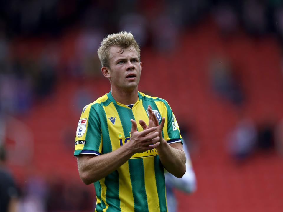 Aune Heggebø applauding WBA fans at Stoke 