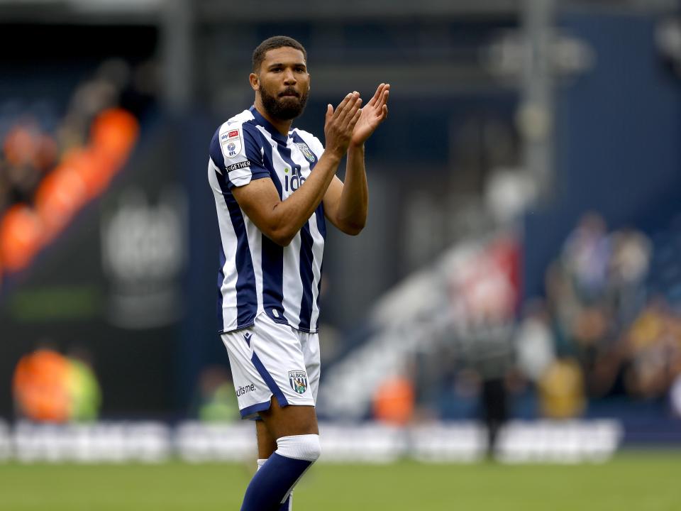 George Campbell applauding WBA fans after the win over Blackburn