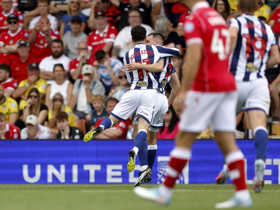 Jed Wallace celebrates with Mikey Johnston after scoring against Wrexham