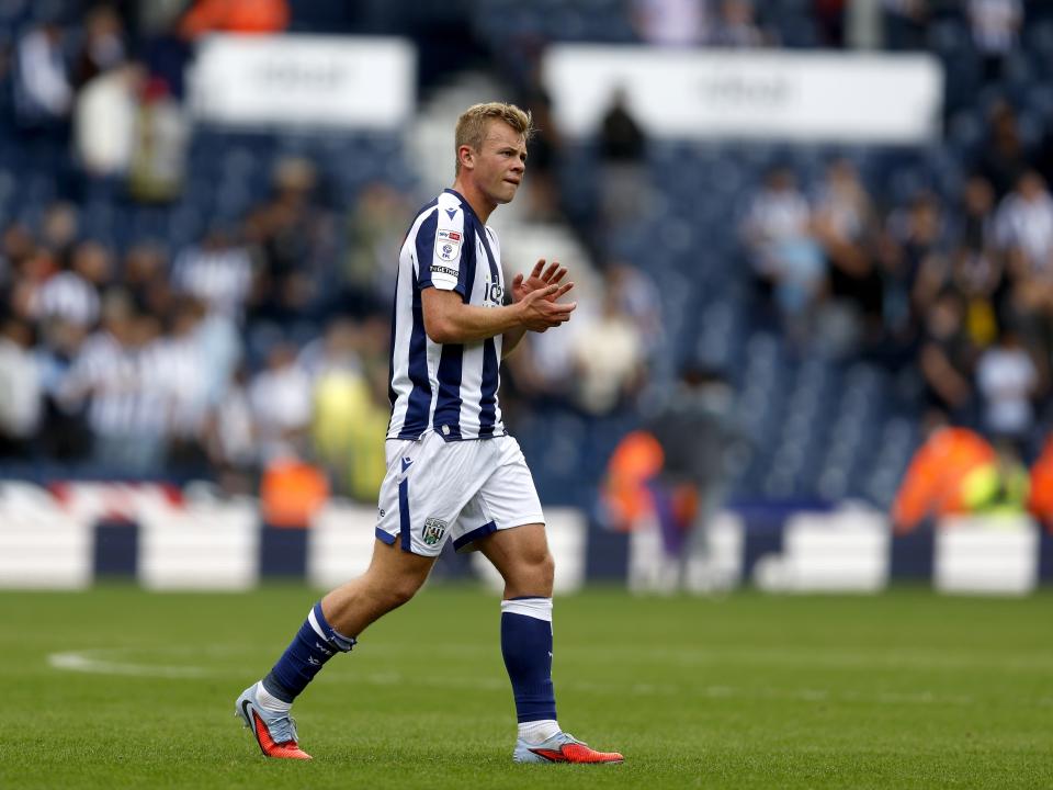 Aune Heggebø applauding WBA fans after the win over Blackburn