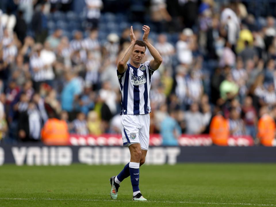 Jed Wallace applauding WBA fans after the win over Blackburn