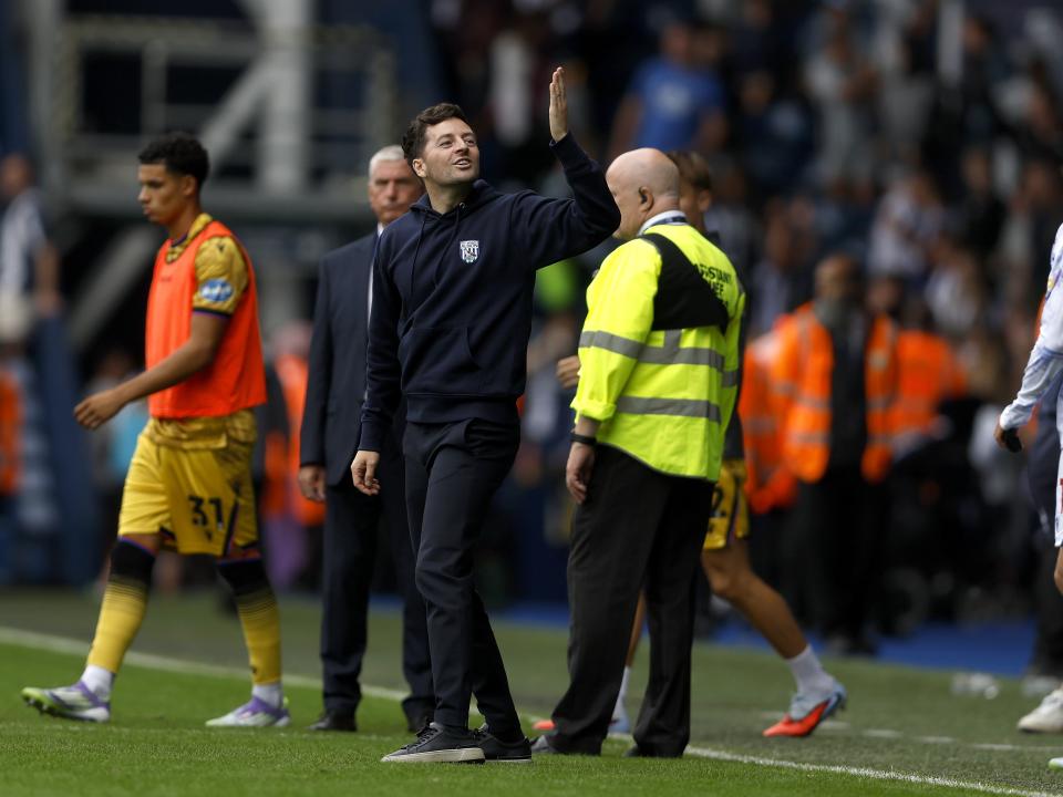 Ryan Mason blowing a kiss to his family while stood on the side of the pitch at The Hawthorns
