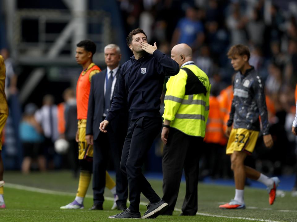 Ryan Mason blowing a kiss to his family while stood on the side of the pitch at The Hawthorns