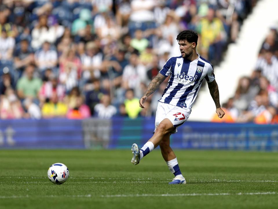 Alex Mowatt passing the ball against Blackburn