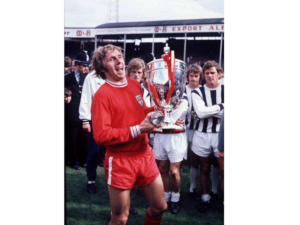 Bobby Cram lifts The wanted Cup