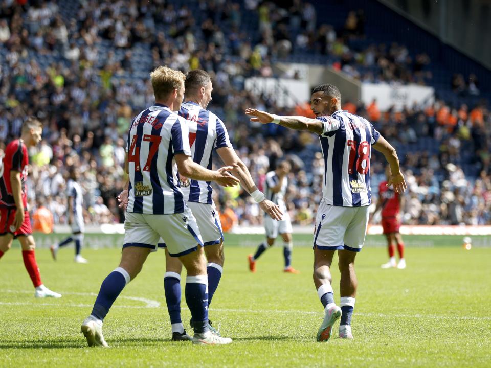 Karlan Grant celebrates with Aune Heggebø and Jed Wallace after scoring at The Hawthorns against Rayo Vallecano