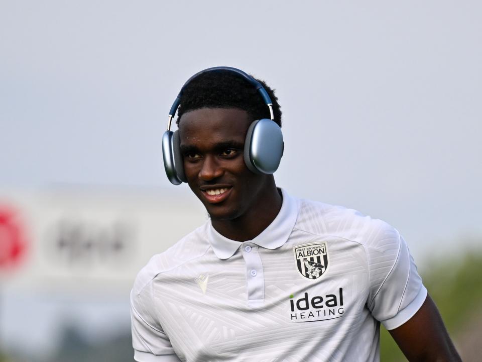 A photo of U21 striker Dan Chimeziri in the 2025/26 white travel gear