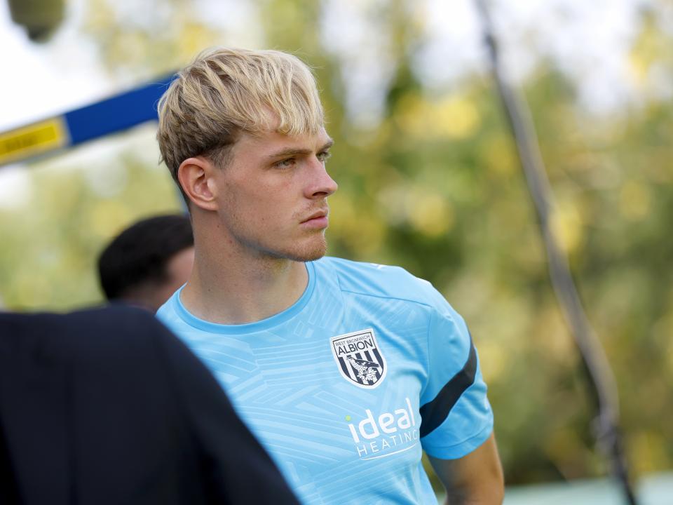 Toby Collyer watching training 