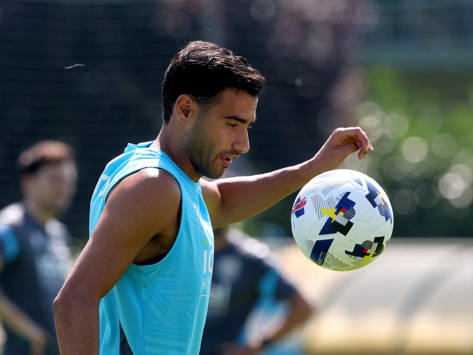 Gianluca Frabotta watching the ball close to his face during a training session