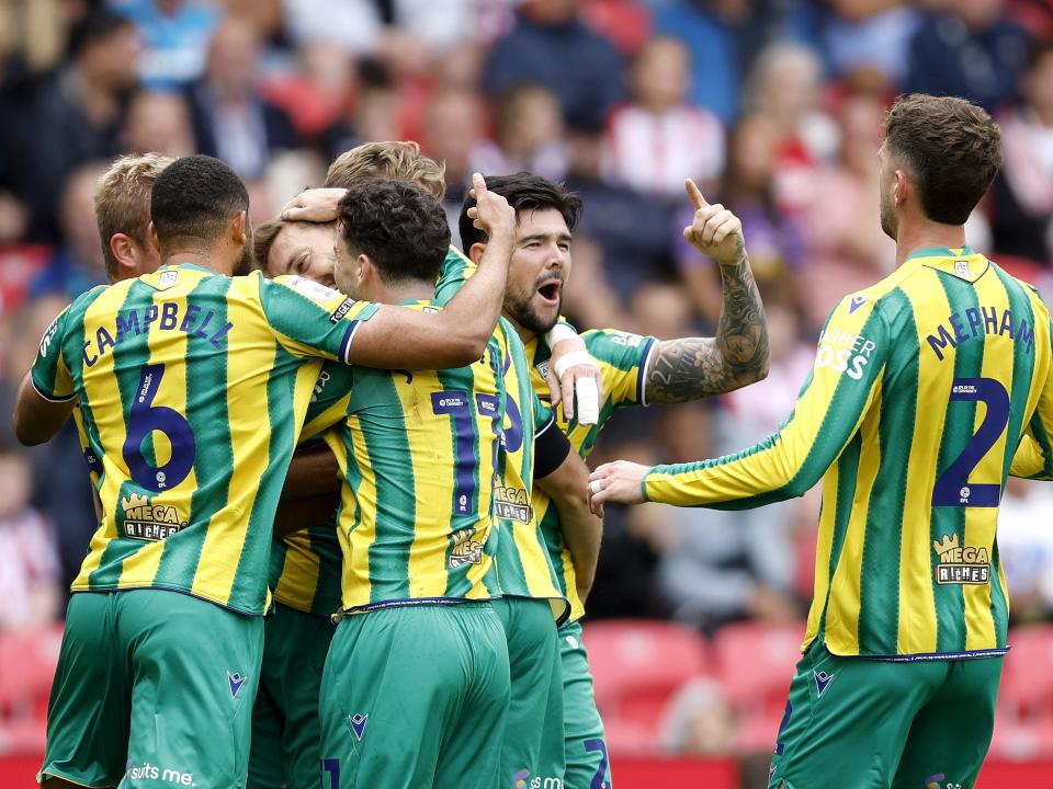 Albion players celebrate Nat Phillips' goal at Stoke 