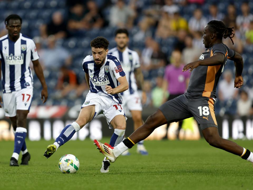 An image of Mikey Johnston in action against Derby