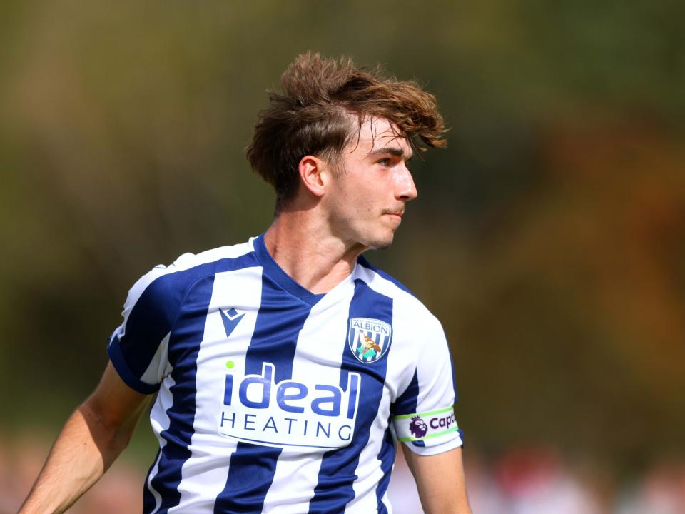 A photo of Albion u18 defender Alfie Maughan in the 2025/26 home kit