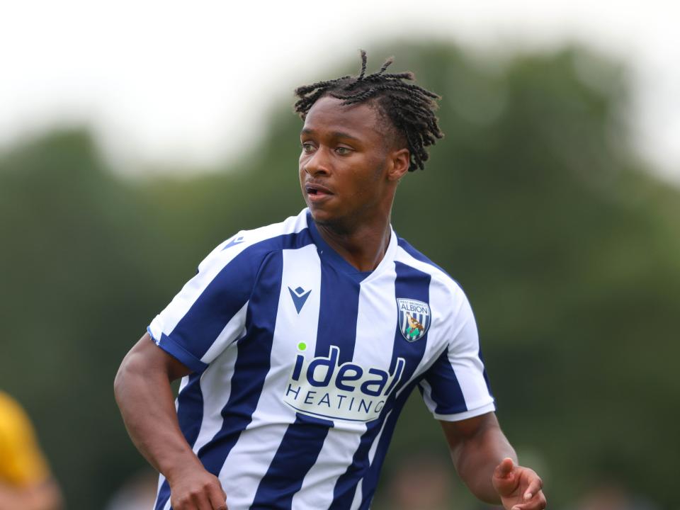 A photo of Albion U18 attacker Remar McNeil in the 2025/26 home kit