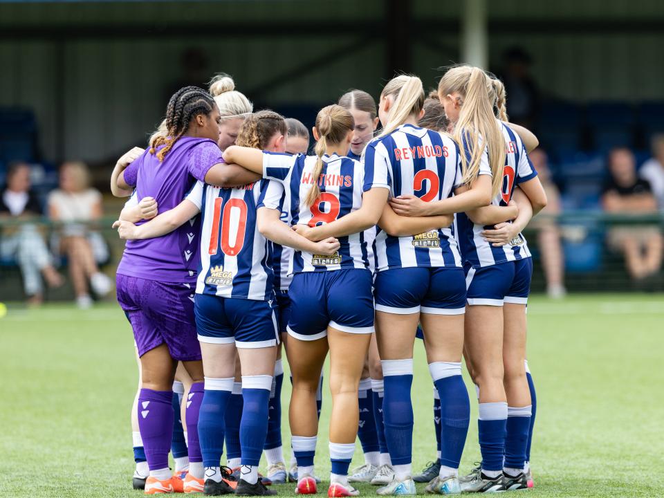 An image of Albion Women in a huddle during a pre-season friendly